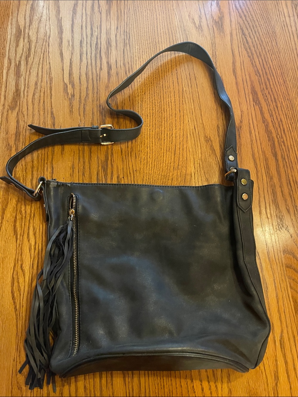 Classic Black Leather Crossbody Bag with Fringe